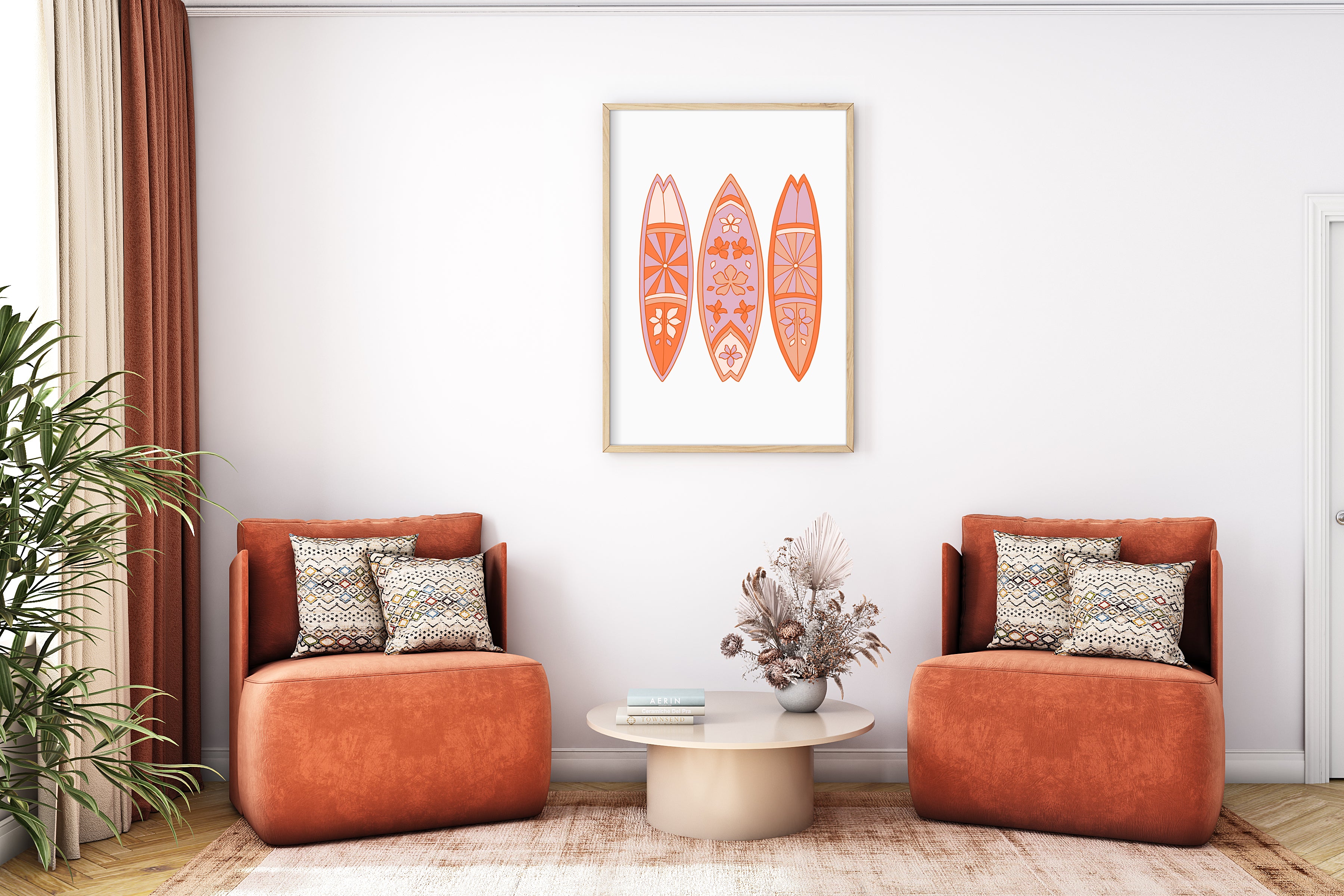 a living room with two orange chairs and a coffee table
