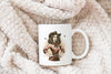 a white coffee mug with a picture of a woman on it