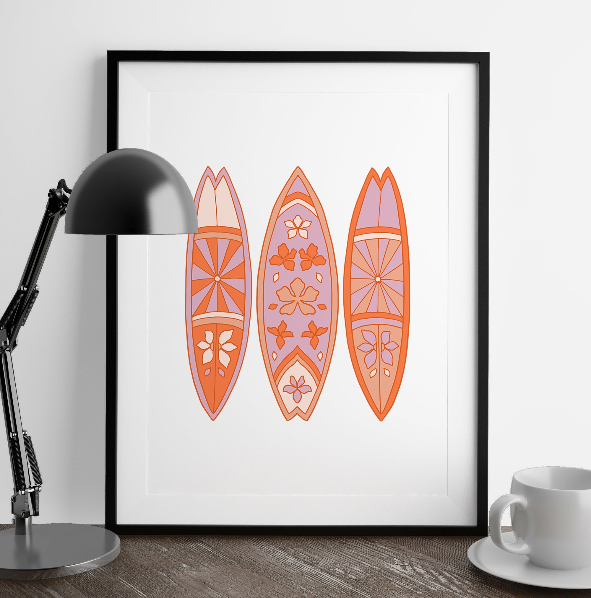 a picture of three surfboards on a wall