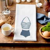 a tea towel with a picture of a woman's face on it