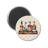 three bottles of liquor on a wooden tray