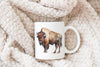 a mug with a picture of a bison on it