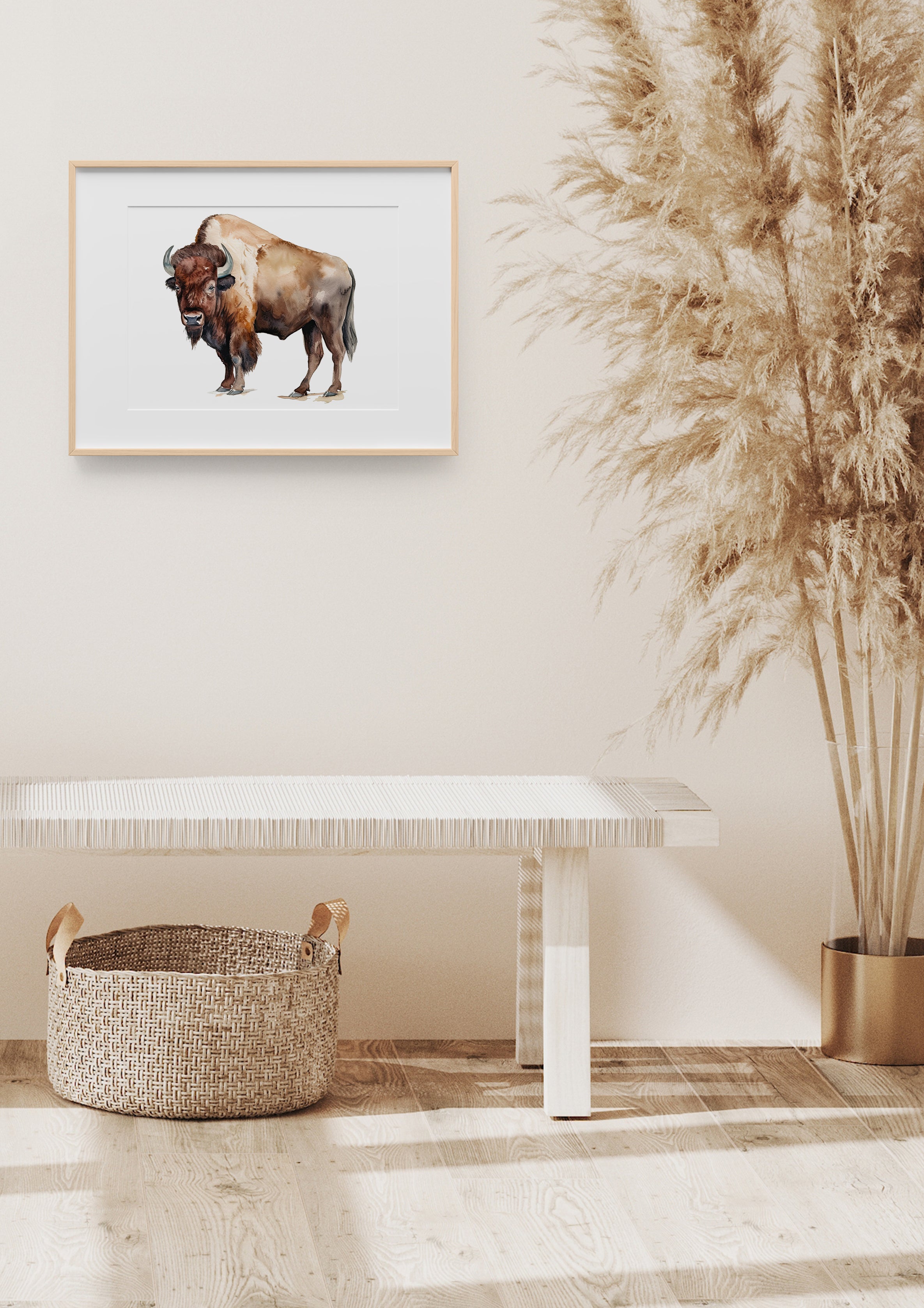 a picture of a bison on a wall above a bench