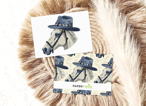 a card with a picture of a horse wearing a hat