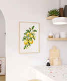 a picture of a lemon tree hanging on a wall