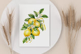 a white plate topped with a painting of lemons