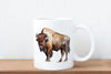 a coffee mug with a picture of a bison on it