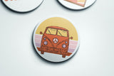 a button with a picture of a bus on it