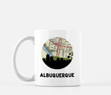 Albuquerque, New Mexico map and skyline mug, a circular city map with the skyline in silhouette
