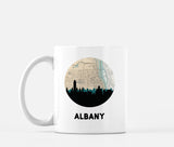 Albany, New York map and skyline mug, a circular city map with the skyline in silhouette