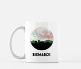 Bismarck, North Dakota map and skyline mug, a circular city map with the skyline in silhouette
