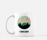 Concord, New Hampshire map and skyline mug, a circular city map with the skyline in silhouette