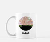 Fargo, North Dakota map and skyline mug, a circular city map with the skyline in silhouette