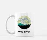 Hood River, Oregon map and skyline mug, a circular city map with the skyline in silhouette