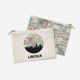 Lincoln, Nebraska map and skyline zipper pouch, a circular city map with the skyline in silhouette