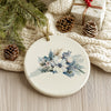 North Carolina Christmas ornament with blue and white flowers