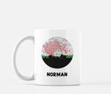 Norman, Oklahoma map and skyline mug, a circular city map with the skyline in silhouette