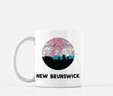 New Brunswick, New Jersey map and skyline mug, a circular city map with the skyline in silhouette