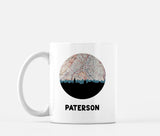 Paterson, New Jersey map and skyline mug, a circular city map with the skyline in silhouette