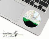 Traverse City, Michigan map and skyline vinyl sticker, a circular city map with the skyline in silhouette