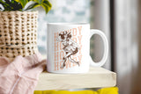 a coffee mug sitting on a shelf next to a potted plant