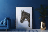 a picture of a horse on a blue wall