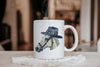 a white coffee mug with a picture of a horse wearing a hat