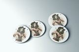 a set of three buttons with a woman in a cowboy hat