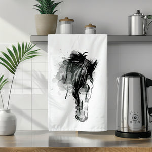 a tea towel with a picture of a horse on it