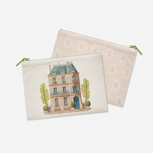 a pair of zipper bags with a picture of a house on them