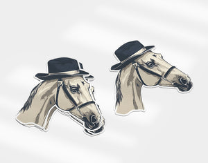 two stickers of a horse wearing a hat