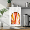 a tea towel with a picture of a sunburst on it