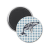 a blue and white checkered pattern with a whale on it