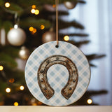 a christmas ornament with a horseshoe hanging from it