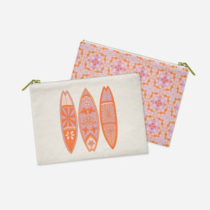 two zippered pouches with designs on them