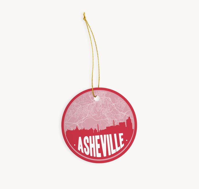 Asheville, North Carolina Christmas ornament in red - featuring the Asheville skyline and an Asheville road map. By Paperfinch Design