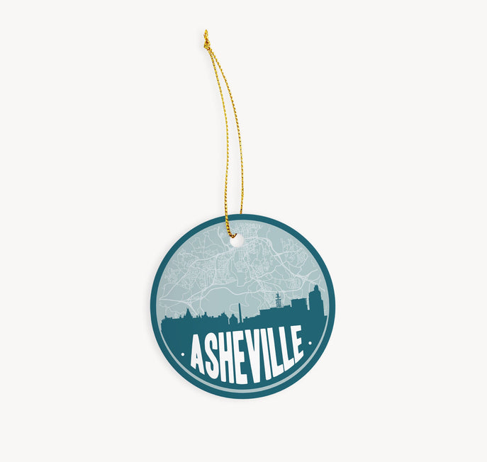 Asheville, North Carolina Christmas ornament in teal - featuring the Asheville skyline and an Asheville road map. By Paperfinch Design