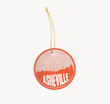 Asheville, North Carolina Christmas ornament in orange - featuring the Asheville skyline and an Asheville road map. By Paperfinch Design