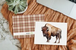 a card with a picture of a bison on it