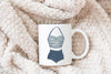 a white mug with a picture of a bathing suit on it