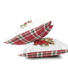 a pair of red and white plaid pillows with poinsettis on them