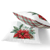 a pair of pillows with poinsettis and pine cones on them