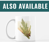 a coffee mug with a picture of a plant on it