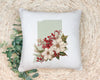 a white pillow with a picture of flowers on it