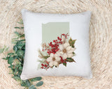 a white pillow with a picture of flowers on it