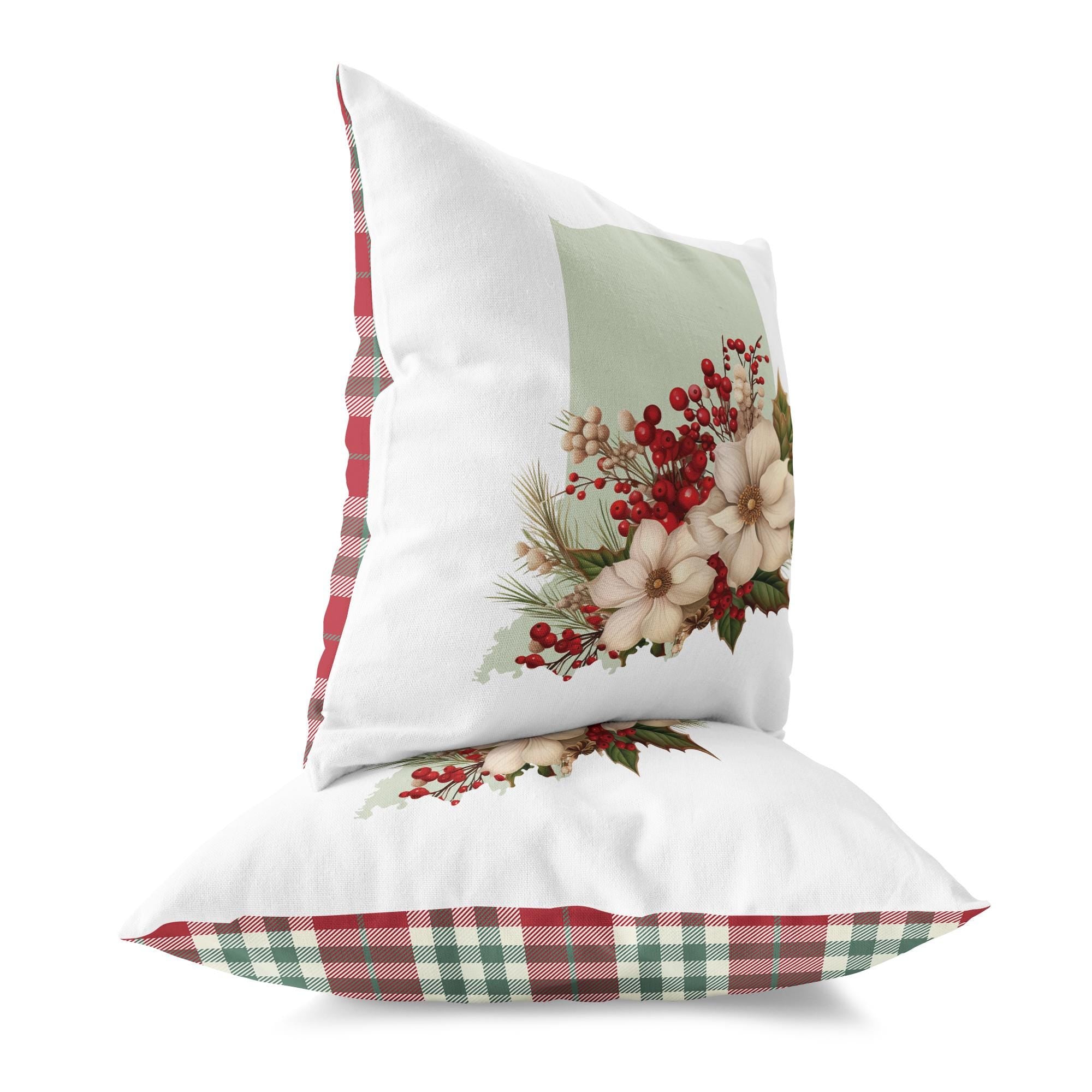 a white pillow with a floral design on it