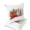 a pair of white pillows with christmas decorations on them