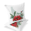 a pair of pillows with poinsettis and pine cones on them