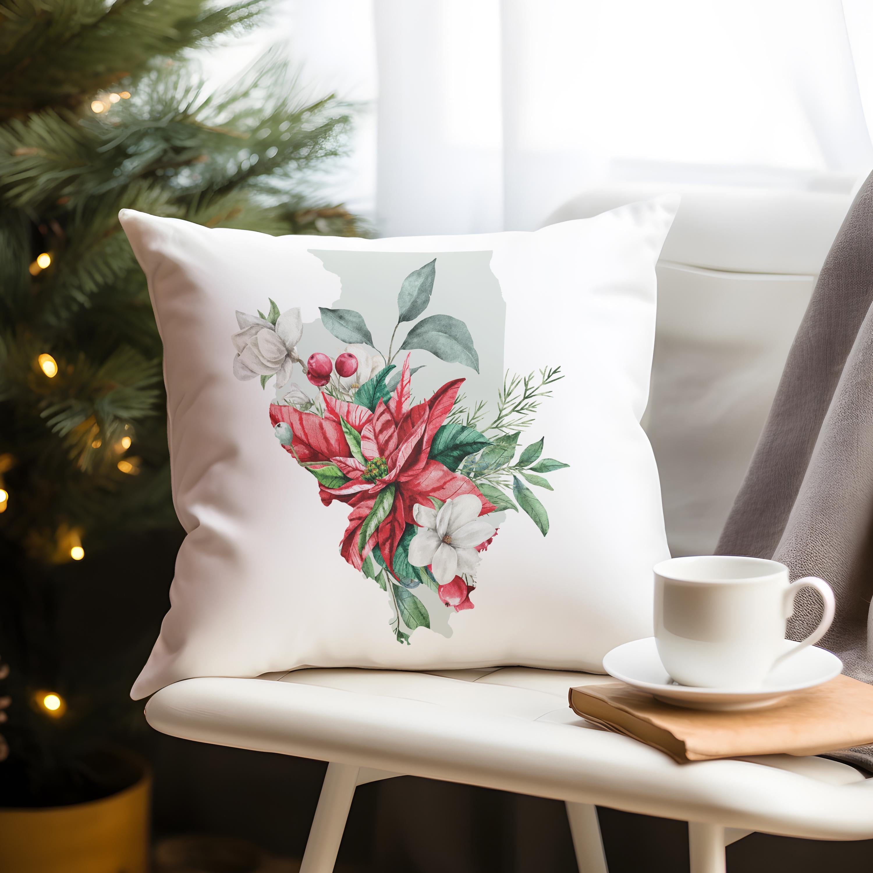 a white chair with a white pillow and a cup of coffee